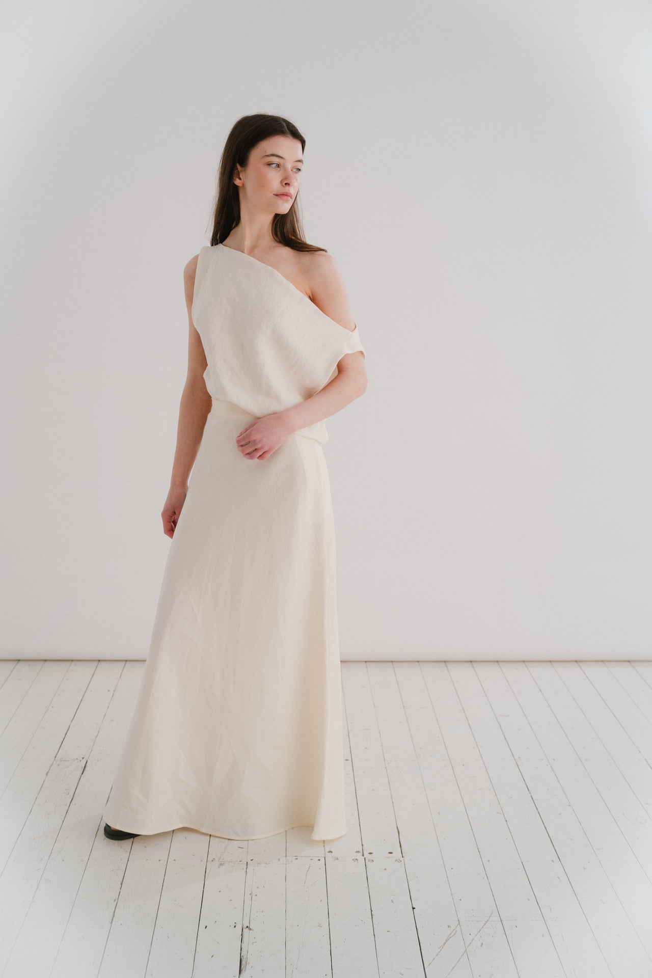 EVIE COWL TOP | A statement in her simplicity. Evie is an absolute staple for your SS wardrobe. Can be worn on or off the shoulder depending on your desired look. A slightly cropped length and side seam zip detail make her a flattering pairing with your f