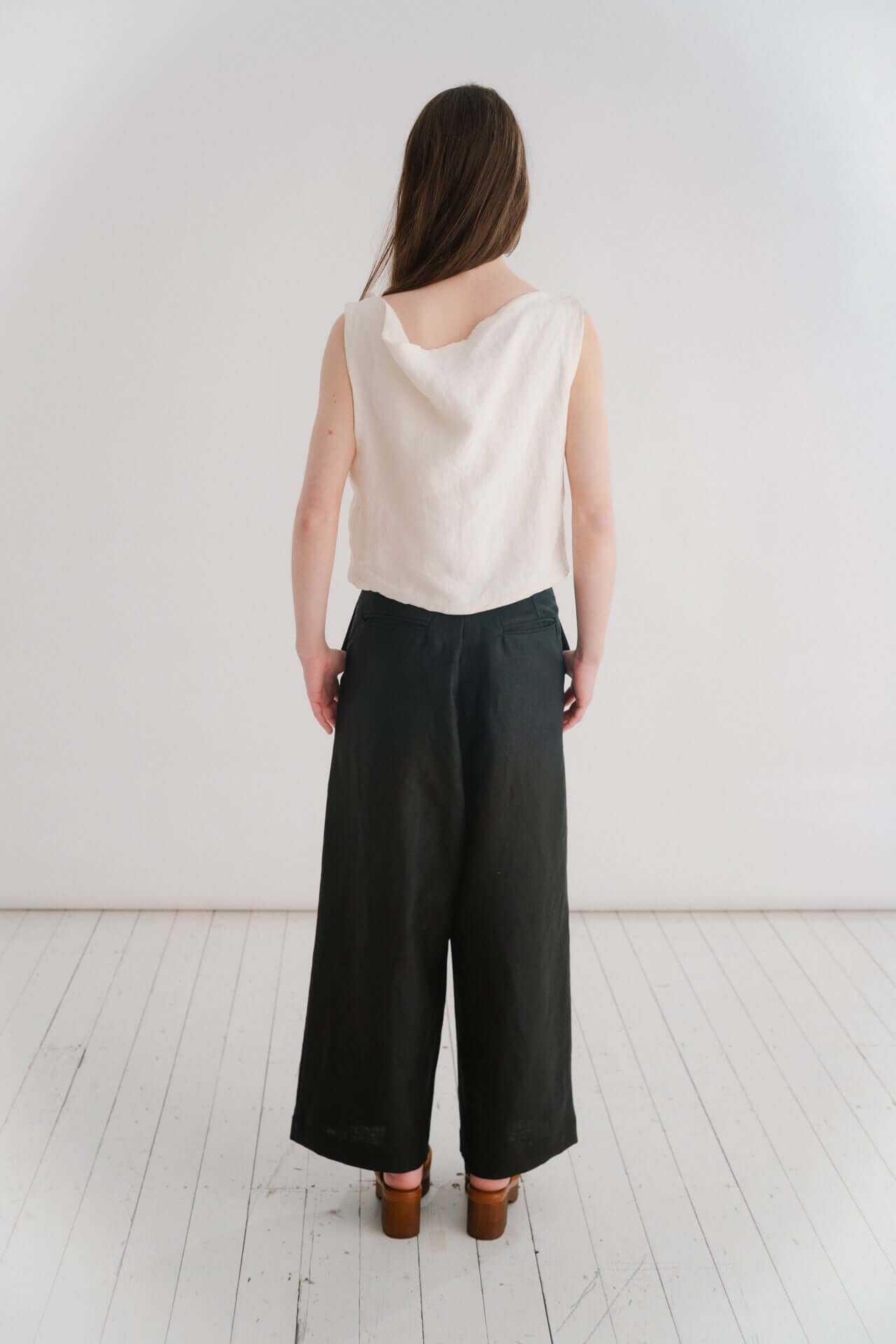 BOYFRIEND TROUSER - BLACK | The Boyfriend Trouser - a new, more tailored piece for SS24. Cut with a dropped crotch and wide leg. Contrasted with a smart waistband and pleat detail, these are so wearable yet will make you feel really put together. They pai