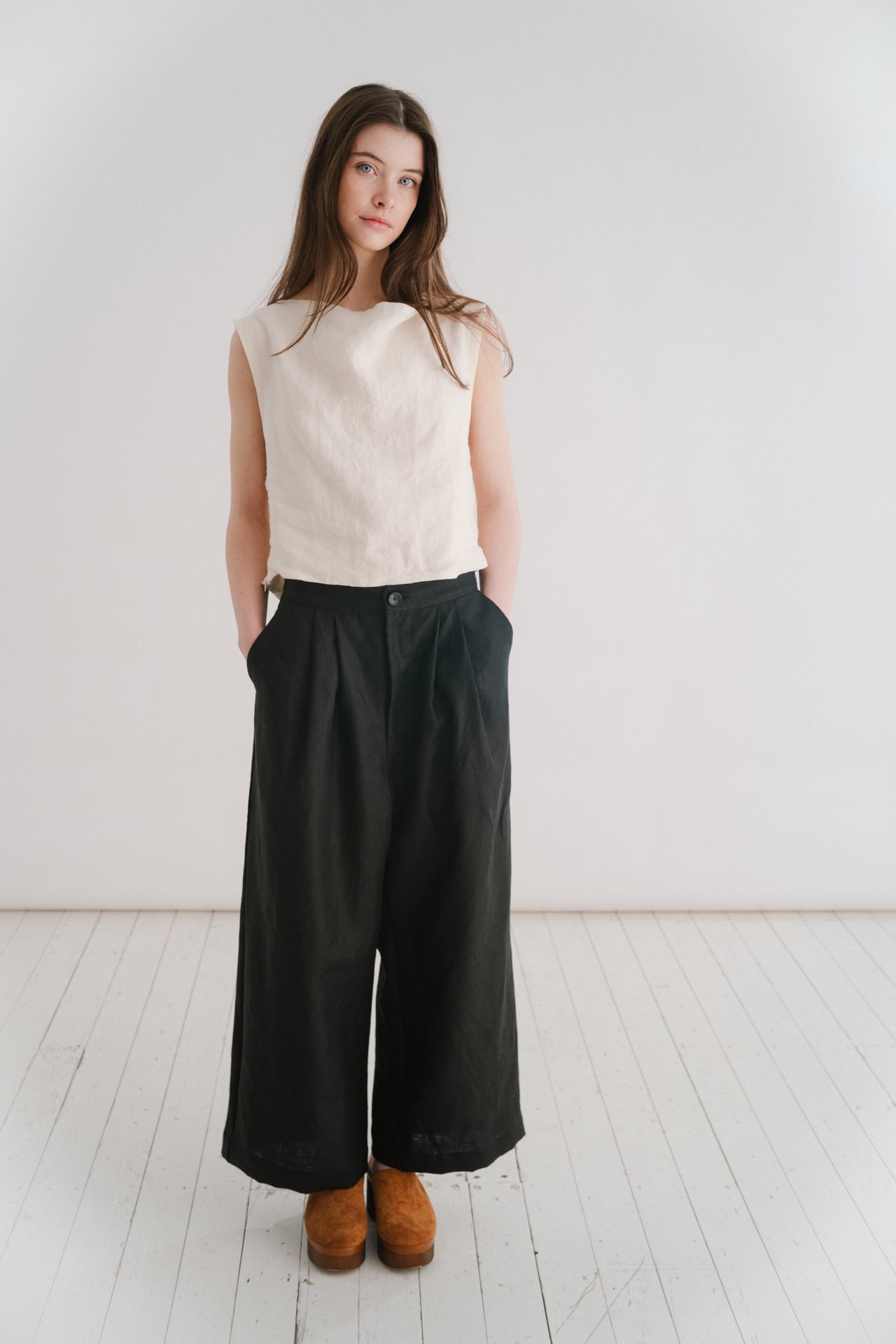BOYFRIEND TROUSER - BLACK | The Boyfriend Trouser - a new, more tailored piece for SS24. Cut with a dropped crotch and wide leg. Contrasted with a smart waistband and pleat detail, these are so wearable yet will make you feel really put together. They pai