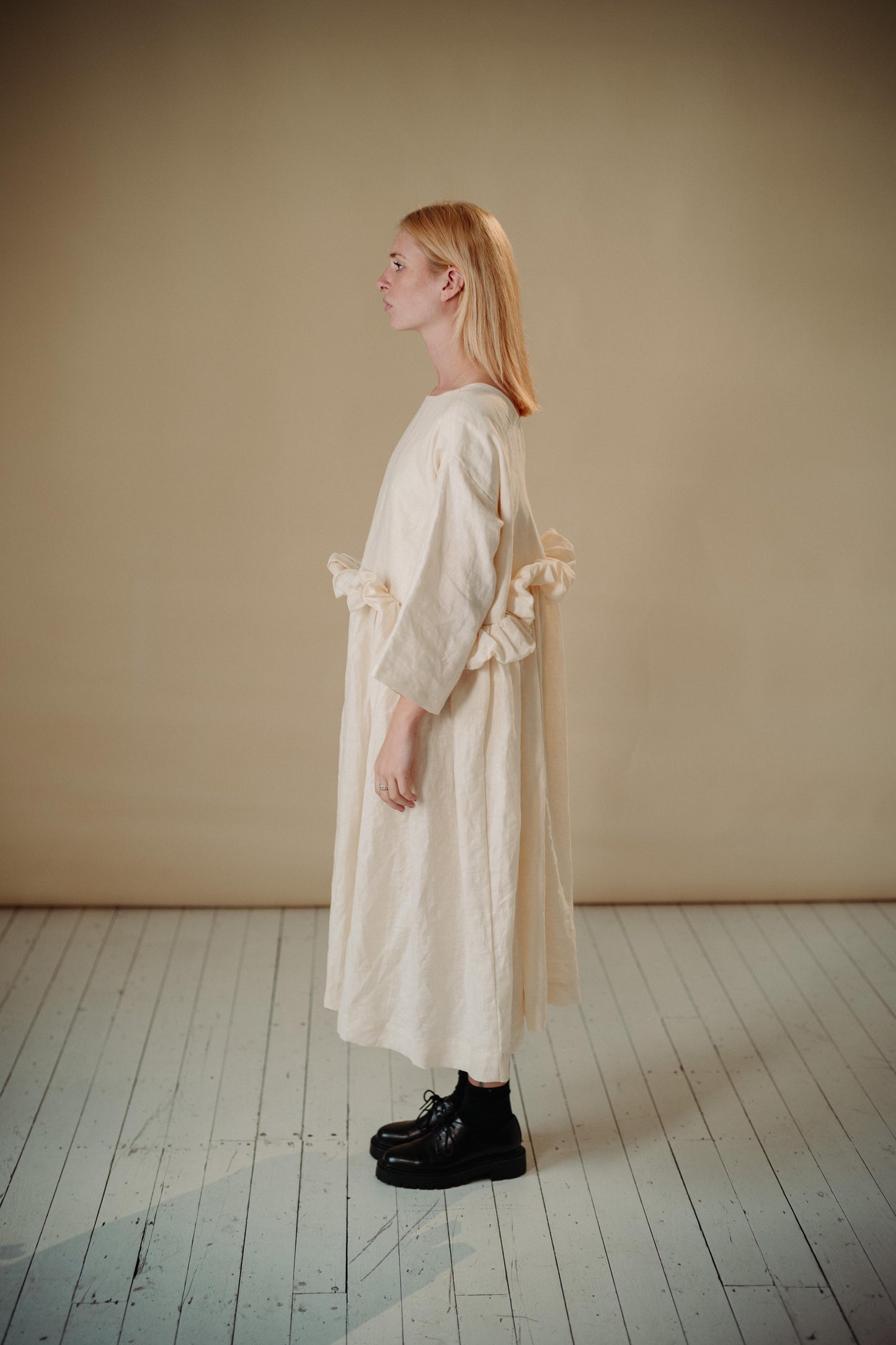 THE PUFF DRESS | MALLOW | Our playful party dress this season.An effortless and feminine silhouette with a playful burst of puffed linen at the waist. Can be worn both ways, with 'V' to the front or back. The 'mallow' colourway features a subtle line of g