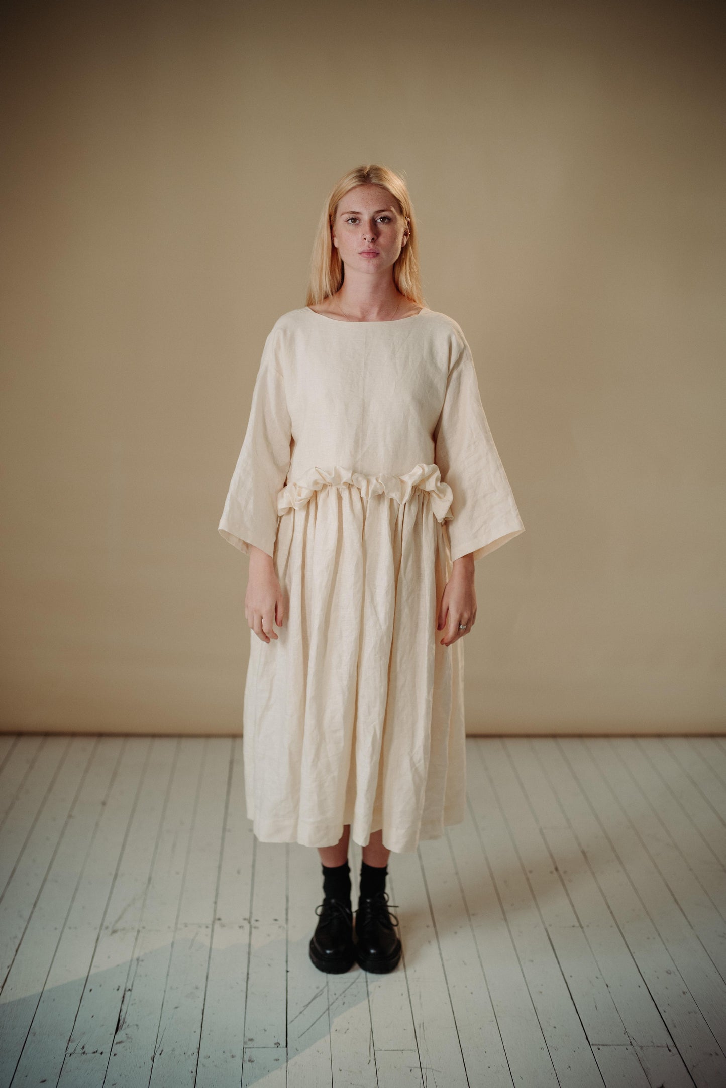 THE PUFF DRESS | MALLOW | Our playful party dress this season.An effortless and feminine silhouette with a playful burst of puffed linen at the waist. Can be worn both ways, with 'V' to the front or back. The 'mallow' colourway features a subtle line of g