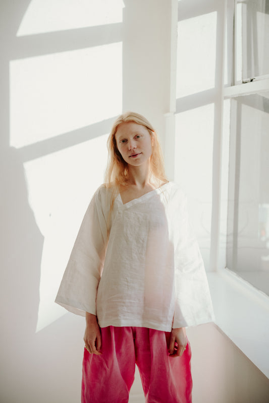 ASYMMETRIC TEE | An update on our best selling staple- the kind tee. This one features a flattering assymetric neckline detail that makes it a little more special than your average white tee, yet really wearable and easy to dress up or down. Wear with our