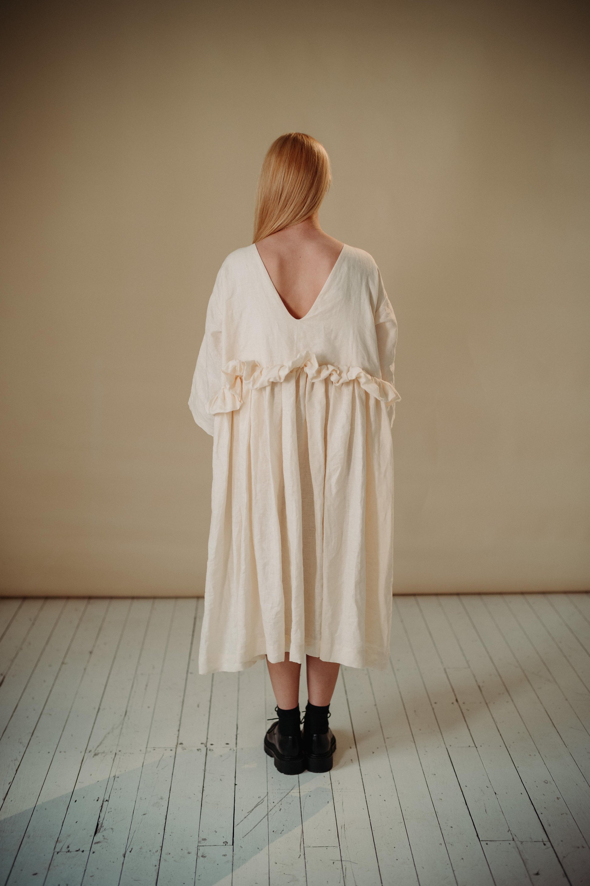 THE PUFF DRESS | MALLOW | Our playful party dress this season.An effortless and feminine silhouette with a playful burst of puffed linen at the waist. Can be worn both ways, with 'V' to the front or back. The 'mallow' colourway features a subtle line of g