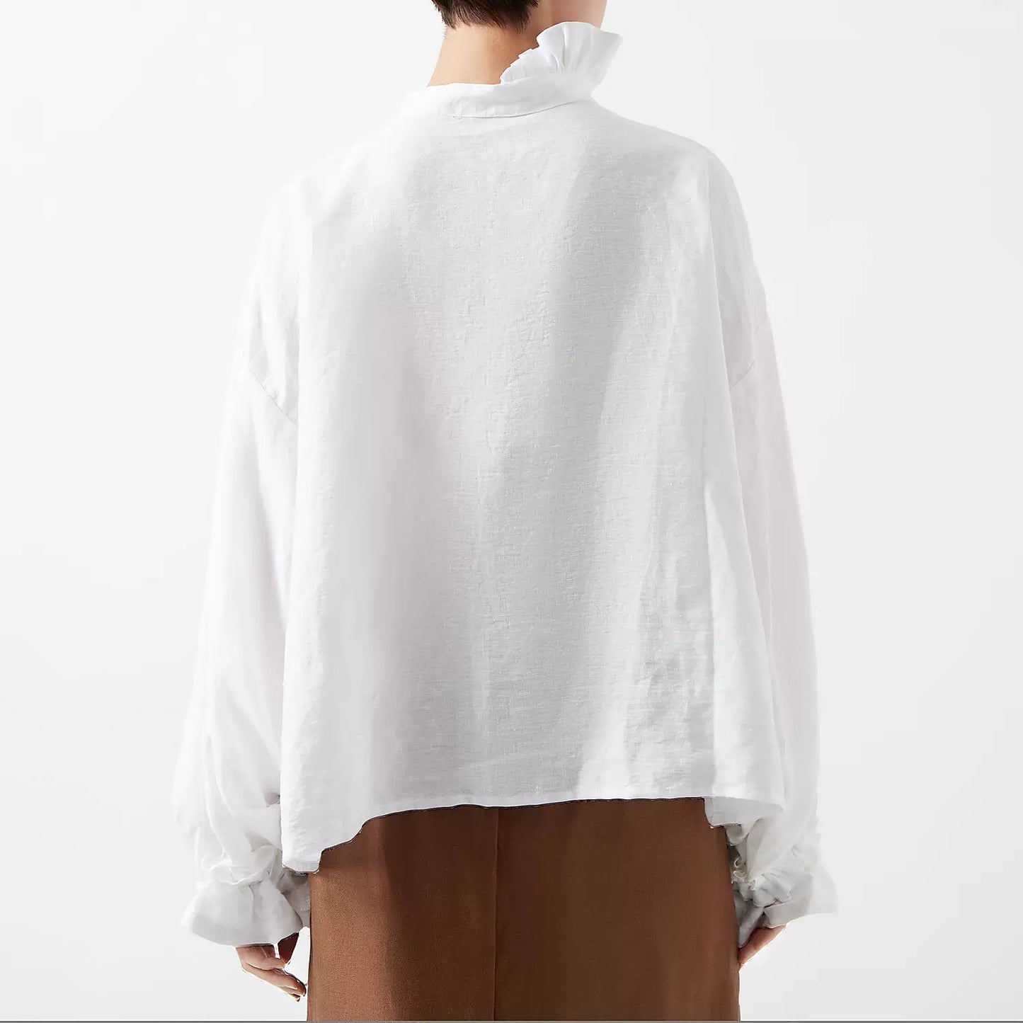 MARSHMALLOW- WHITE | An updated colourway of our favourite 'Marshmallow Blouse' for AW23- created in a luxurious white linen, this one is a play on the classic white linen shirt. Like many of our styles, this one can be worn with buttons to the front or t