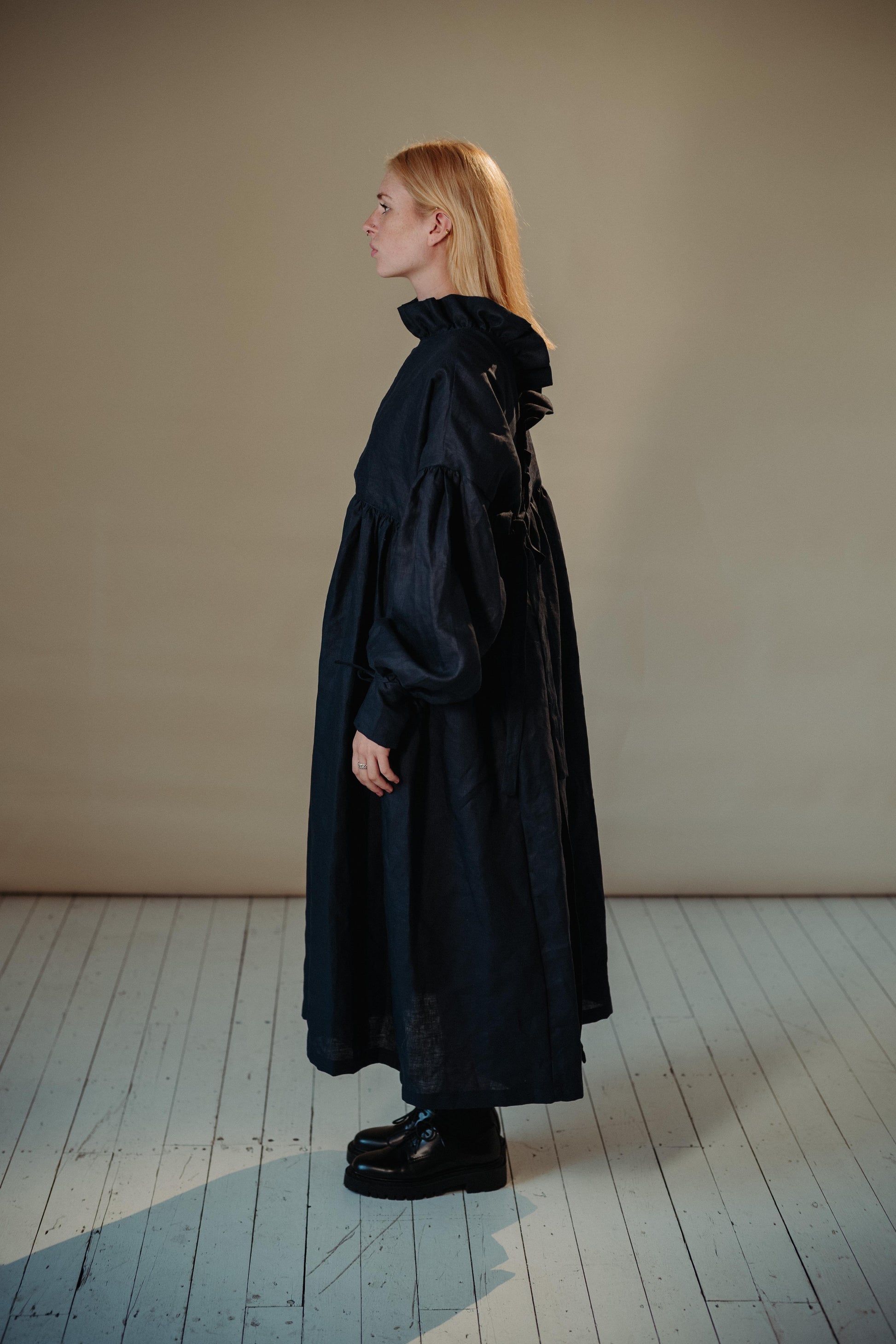 CAMILLE DRESS | NAVY | She has become one of our signature pieces, so we thought it only right to offer a wintery navy version. Camille is a delight to wear. A wrap dress that features a ruffle collar, balloon sleeves and a bow cuff detail. The dress can