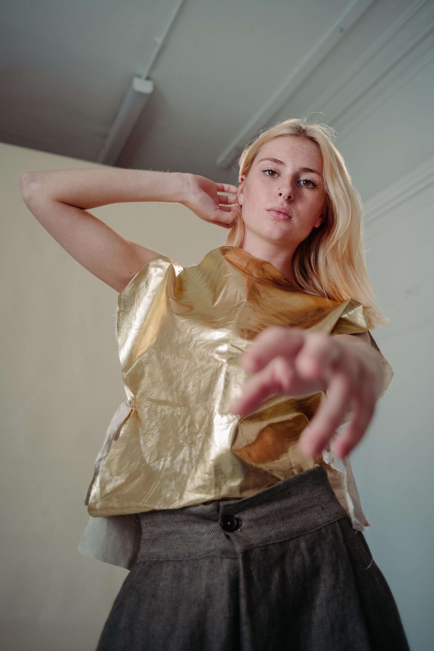 'FIND THE GOLD' VEST | Inspired by the signature golden circles of Irish artist Patrick Scott. The gold vest is the accent your staple wardrobe needs. Cut in the most simplified shape to allow the gold dry beetled linen have it's moment. Features adjustab