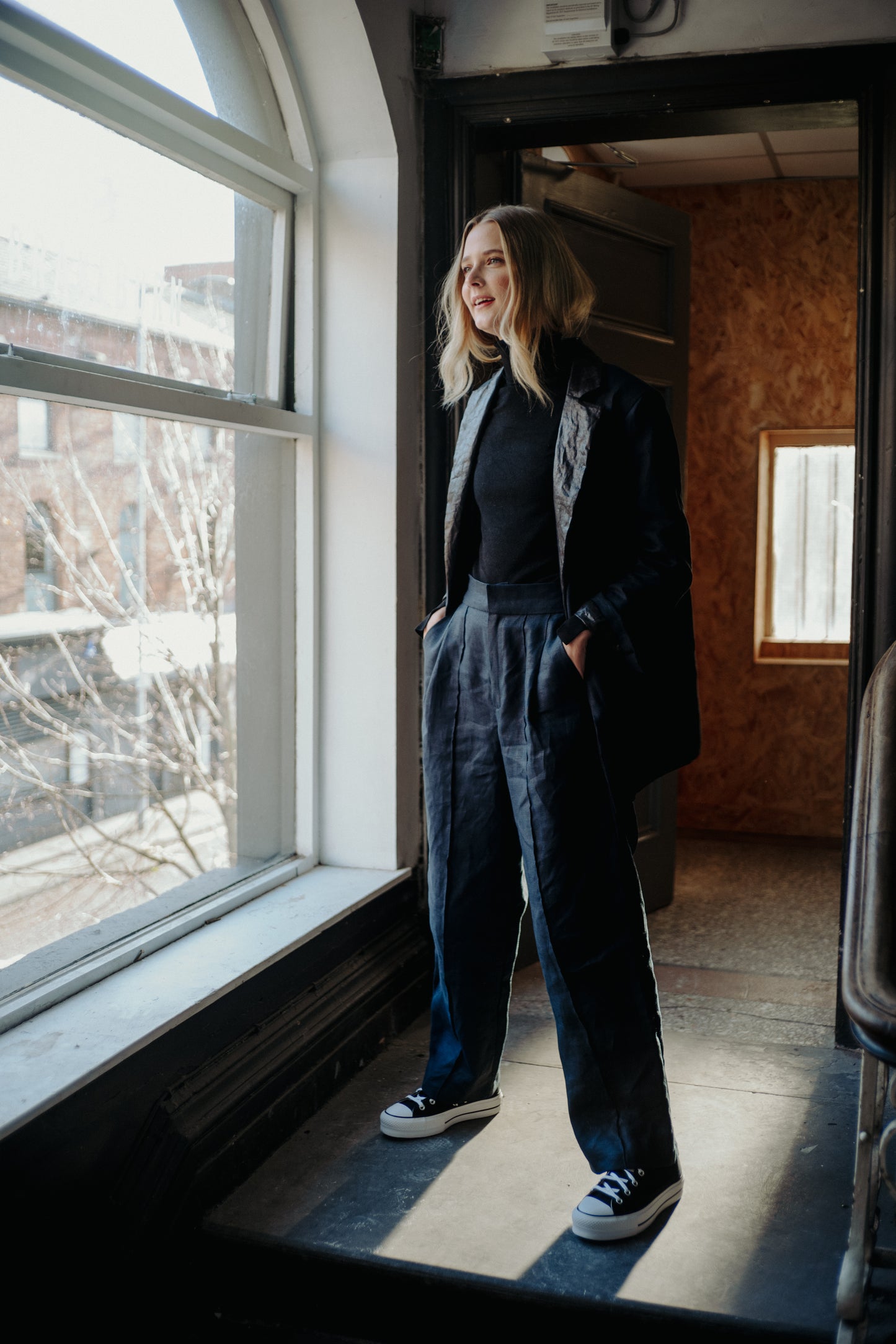 NAVY | BLACK BEETLED SUIT JACKET | Our spin on the classic suit jacket. Our new suit is where structure and tailoring meet relaxed oversized fit, making it a perfect day to day throw on that is versatile enough to wear to the office as well as a festive p
