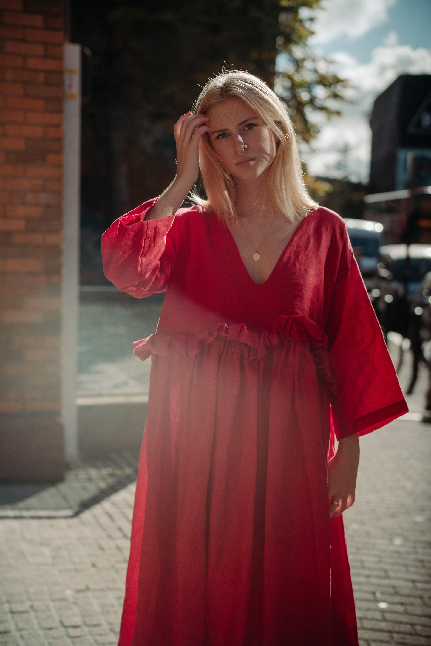 THE PUFF DRESS | POPPY | Our playful party dress this season.An effortless and feminine silhouette with a playful burst of puffed linen at the waist. Can be worn both ways, with 'V' to the front or back. The 'poppy' colourway is vibrant and fun. Created w