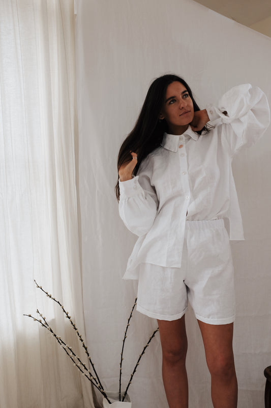 CADHLA | PEARL SET | Pajamas for the outdoors. Whether you’re lounging at home, by the pool, or nipping out for a coffee in the sunshine, our Cadhla linen loungewear set is what your wardrobe is crying out for. The Cadhla shirt can be worn on reverse with