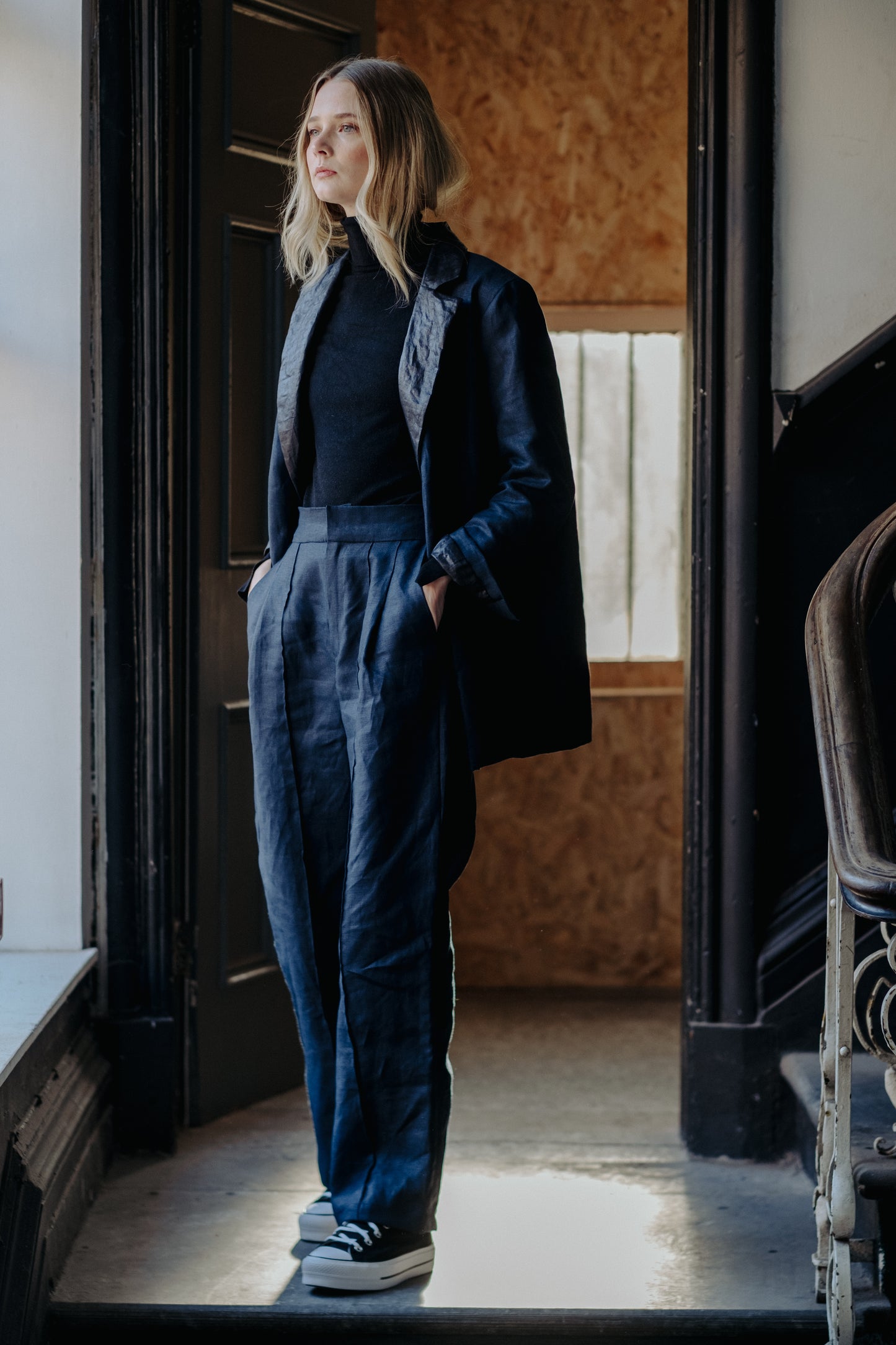 NAVY | BLACK BEETLED SUIT JACKET | Our spin on the classic suit jacket. Our new suit is where structure and tailoring meet relaxed oversized fit, making it a perfect day to day throw on that is versatile enough to wear to the office as well as a festive p