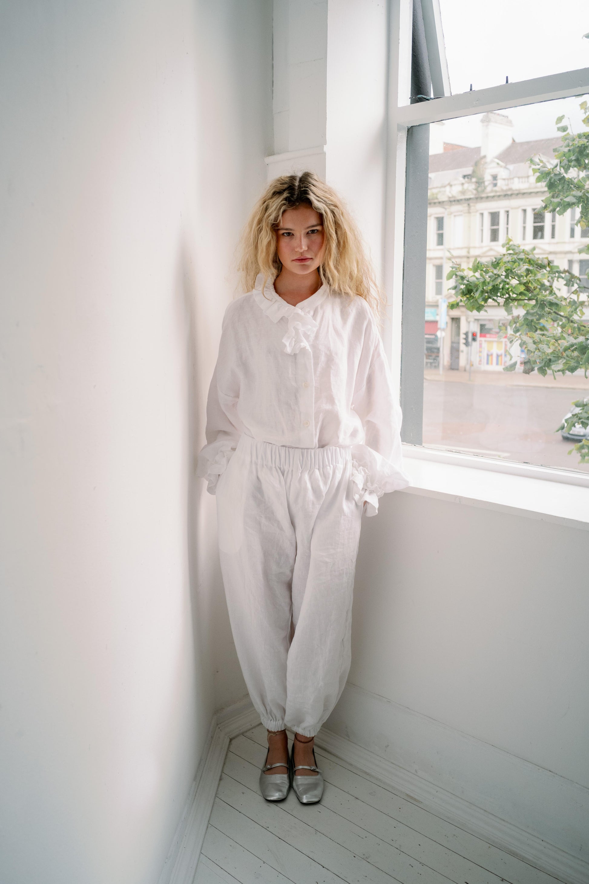 MARSHMALLOW- WHITE | An updated colourway of our favourite 'Marshmallow Blouse' for AW23- created in a luxurious white linen, this one is a play on the classic white linen shirt. Like many of our styles, this one can be worn with buttons to the front or t