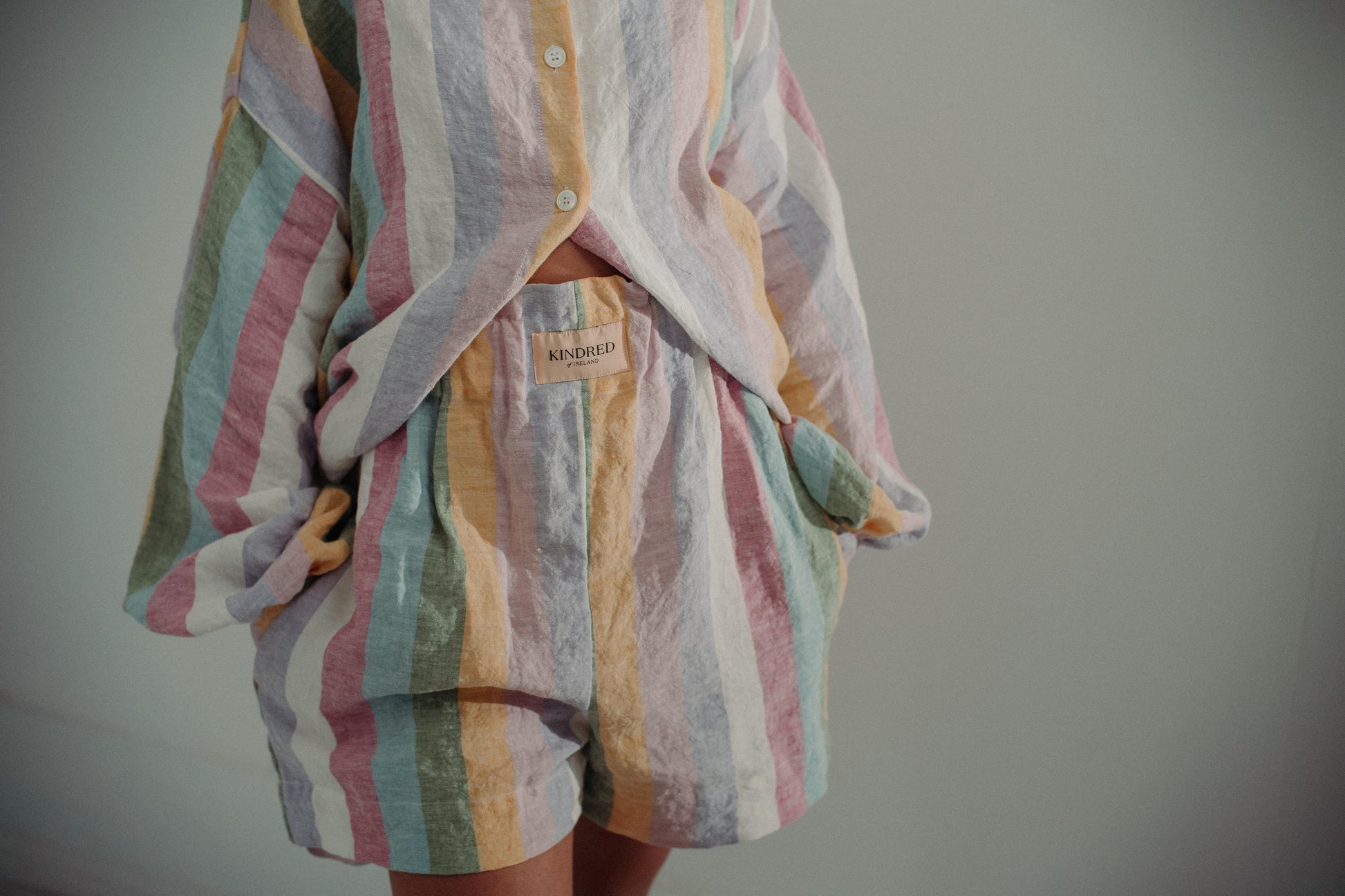 DOVE CADHLA SHORTS | Add a subtle spash of colour to your Summer wardrobe. The Dove shorts are created with our custom rainbow stripe Irish linen. The shorts are comfortable and flattering making them an easy to wear summer staple. An elasticated waistban