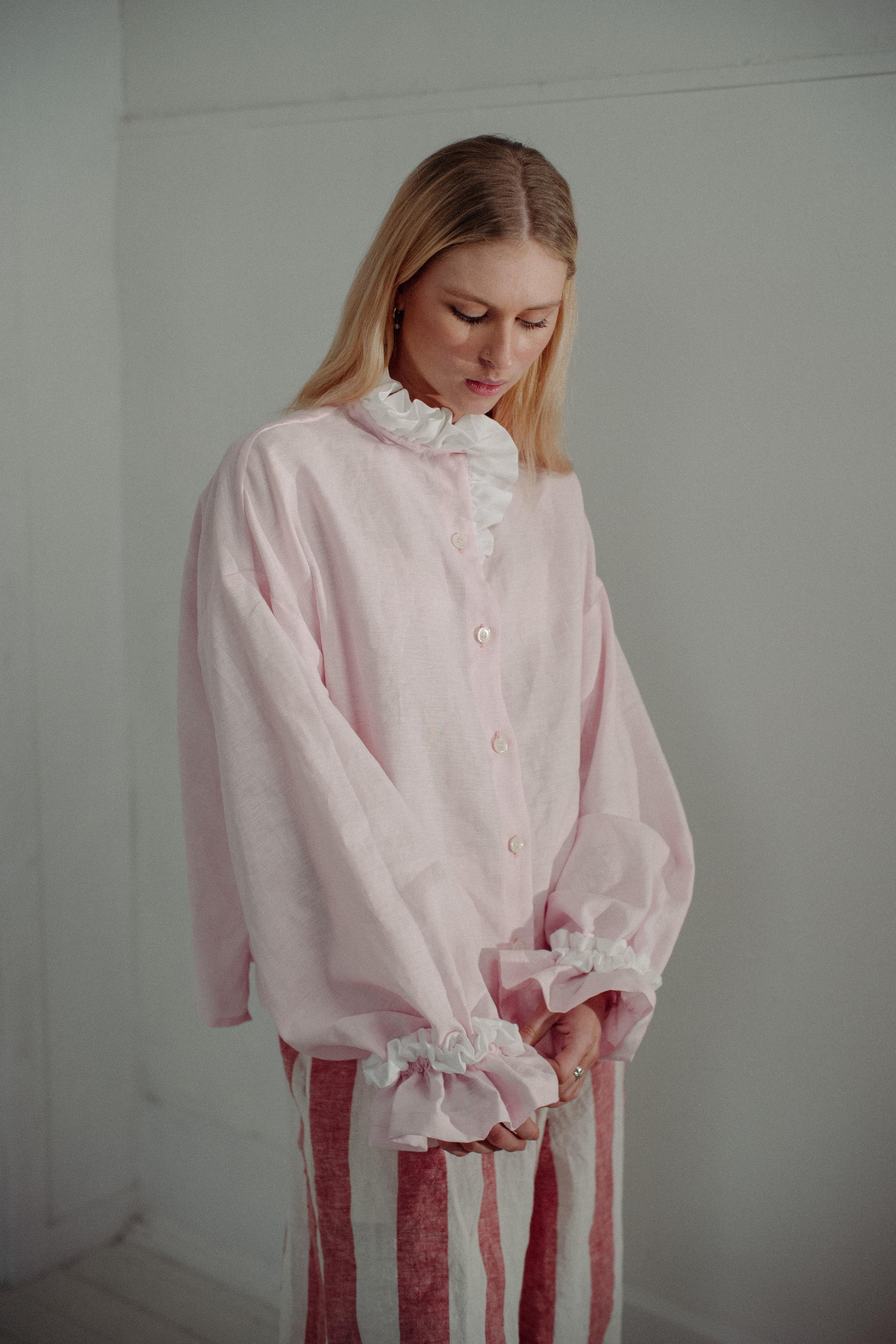 MARSHMALLOW BLOUSE | The Marshmallow Blouse is a fun interpretation of a favourite summer memory of toasting marshallows round the fire on the beach. The shirt features an assymetric frill detail on the collar - one side has structured white frills and th