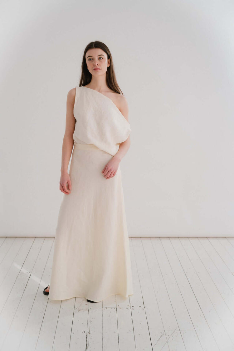 THE EVERYTHING SKIRT - IVORY | A new staple for SS24, the ‘everything’ skirt lives up to her name. An elegant bias cut makes this one feel really special to wear, whether you are pairing it with a simple tee, knit or our Evie top and heels for a more elev