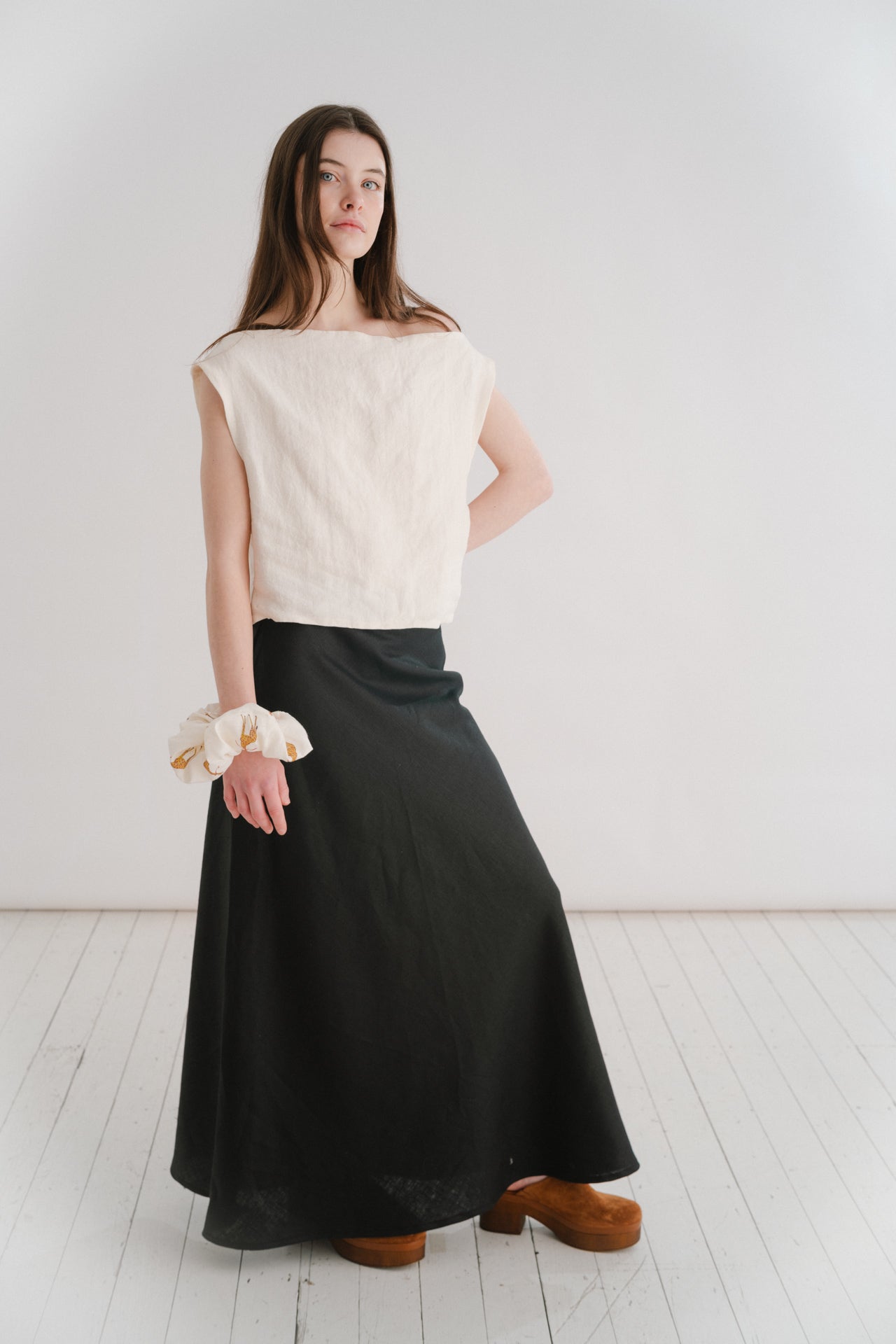 THE EVERYTHING SKIRT - BLACK | A new staple for SS24, the ‘everything’ skirt lives up to her name. An elegant bias cut makes this one feel really special to wear, whether you are pairing it with a simple tee, knit or our Evie top and heels for a more elev