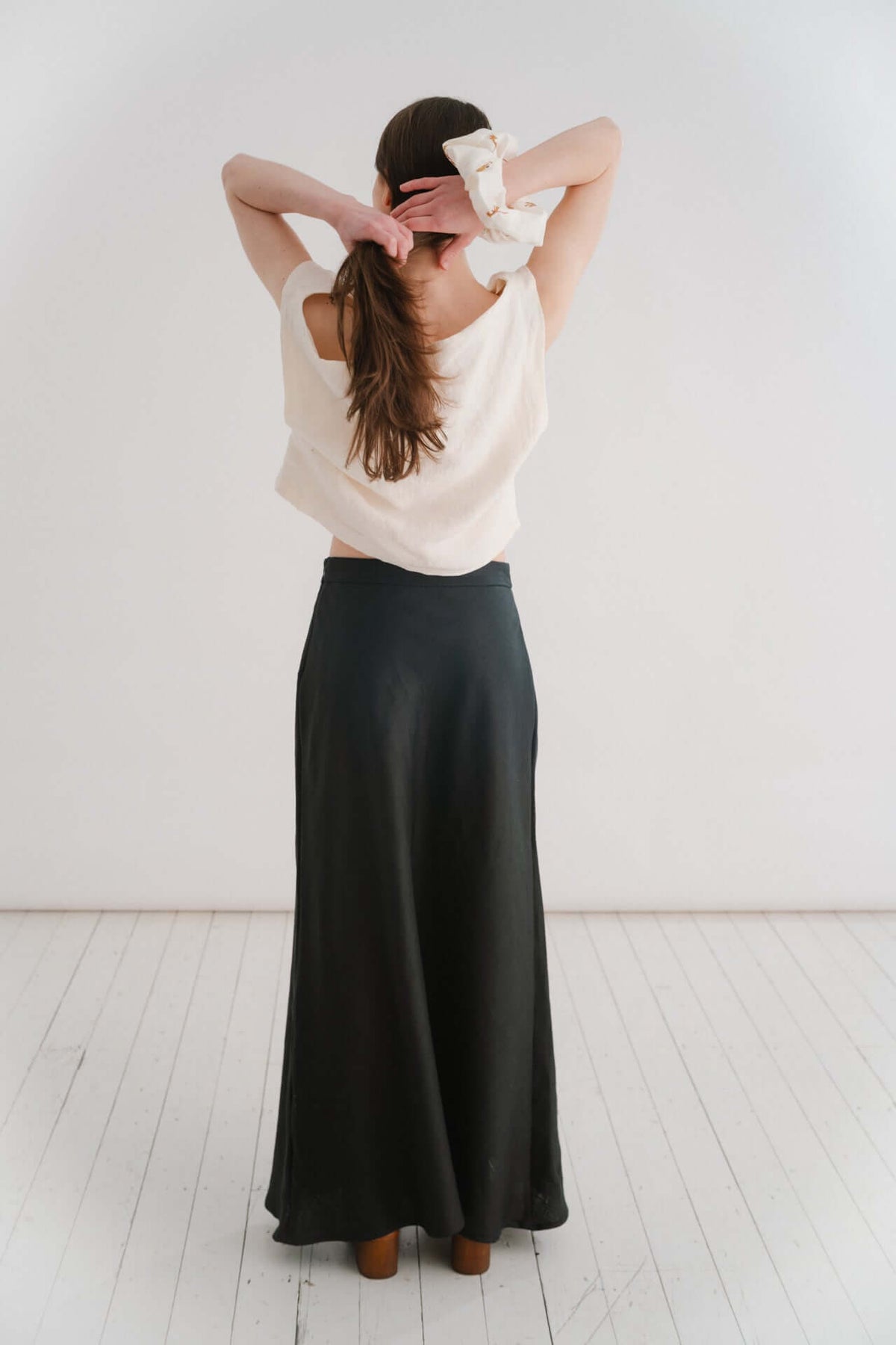 THE EVERYTHING SKIRT - BLACK | A new staple for SS24, the ‘everything’ skirt lives up to her name. An elegant bias cut makes this one feel really special to wear, whether you are pairing it with a simple tee, knit or our Evie top and heels for a more elev
