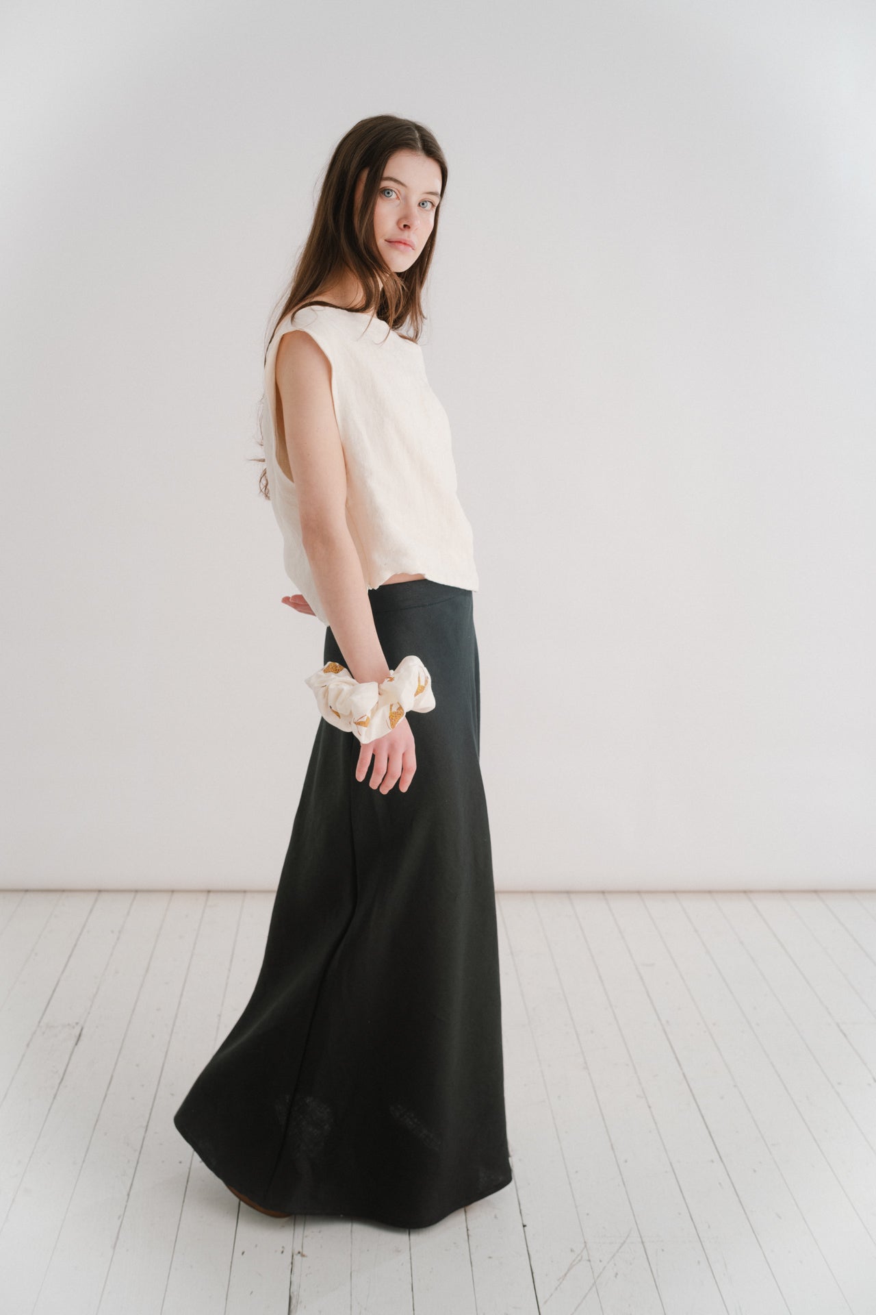 THE EVERYTHING SKIRT - BLACK | A new staple for SS24, the ‘everything’ skirt lives up to her name. An elegant bias cut makes this one feel really special to wear, whether you are pairing it with a simple tee, knit or our Evie top and heels for a more elev