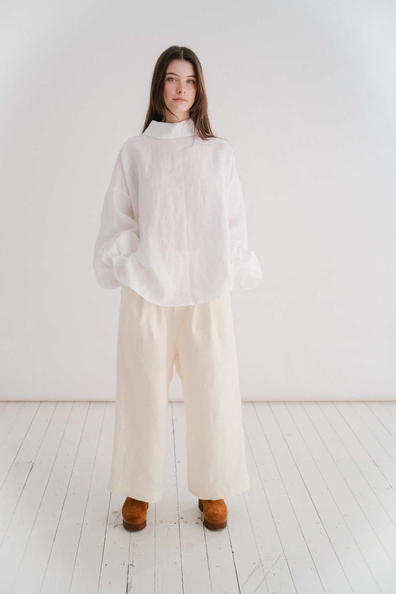 CADHLA SHIRT | WHITE | Relaxed, elegant and versatile. Cadhla - an Irish name translated as beauty. A Kindred favourite, and our first ever piece, this shirt examplifies the easy-wear ethos of the brand. Wear on one side with buttons for a beautiful dayti