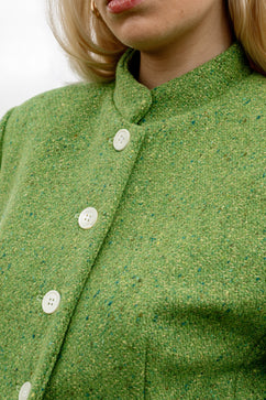 Inheritance Blazer in Shamrock tweed, original campaign close-up of the green weave, gold threads and ivory buttons by Emma Kenny.