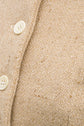 Inheritance Coat in Candlelight Tweed, original campaign macro of the cream wool, gold threads and ivory buttons by Emma Kenny.