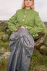 Beetled Bow Skirt in Slate, campaign detail of the shaped waist, bow and lustrous linen by Emma Kenny.