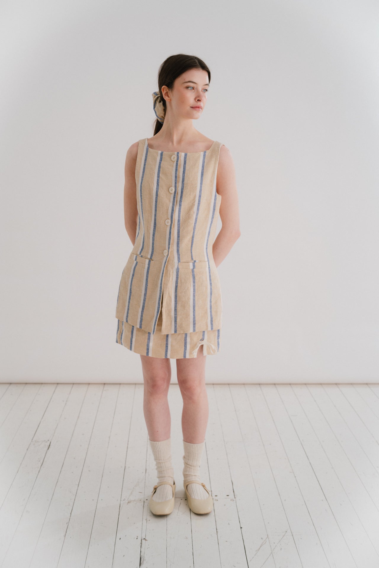 THE MIA MINI - STRIPE | Our very first mini - the Mia skirt has been designed to be the throw on piece that you will continue to reach for this Summer. A delicate bow detail on the front right gives it a little something special. Flat waistband at the fro