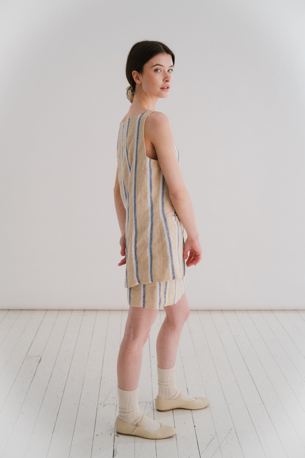 GRACE WAISTCOAT - STRIPE | A new shape for SS24, inspired by vintage safari wear. The Grace waistcoat is elegant in her simplicity. Cut with a flattering square neckline that is reflected in the arm hole detail, ever so slightly shaped to nip in at the wa