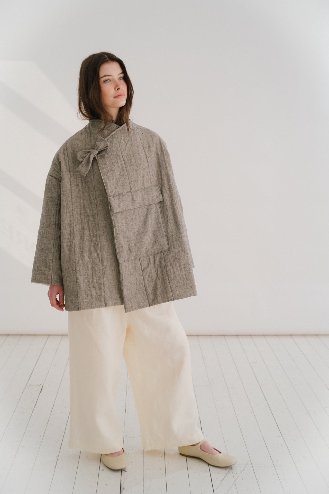 BLANKET JACKET | New for SS24- The Blanket Jacket. Inspired by the idea of wrapping yourself up in a warm blanket to star gaze at night. Cut in a simple kimono shape, hand quilted in our Belfast studio. Created with our new soft black and white check line