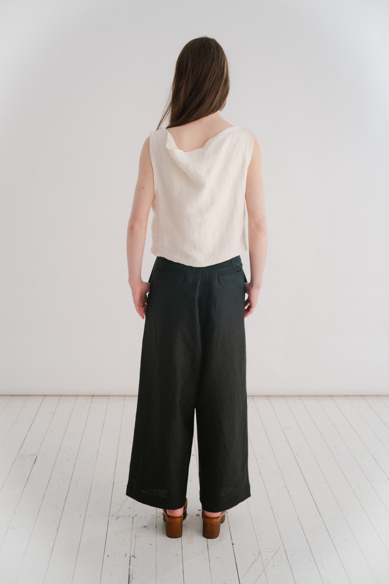 BOYFRIEND TROUSER - BLACK | The Boyfriend Trouser - a new, more tailored piece for SS24. Cut with a dropped crotch and wide leg. Contrasted with a smart waistband and pleat detail, these are so wearable yet will make you feel really put together. They pai
