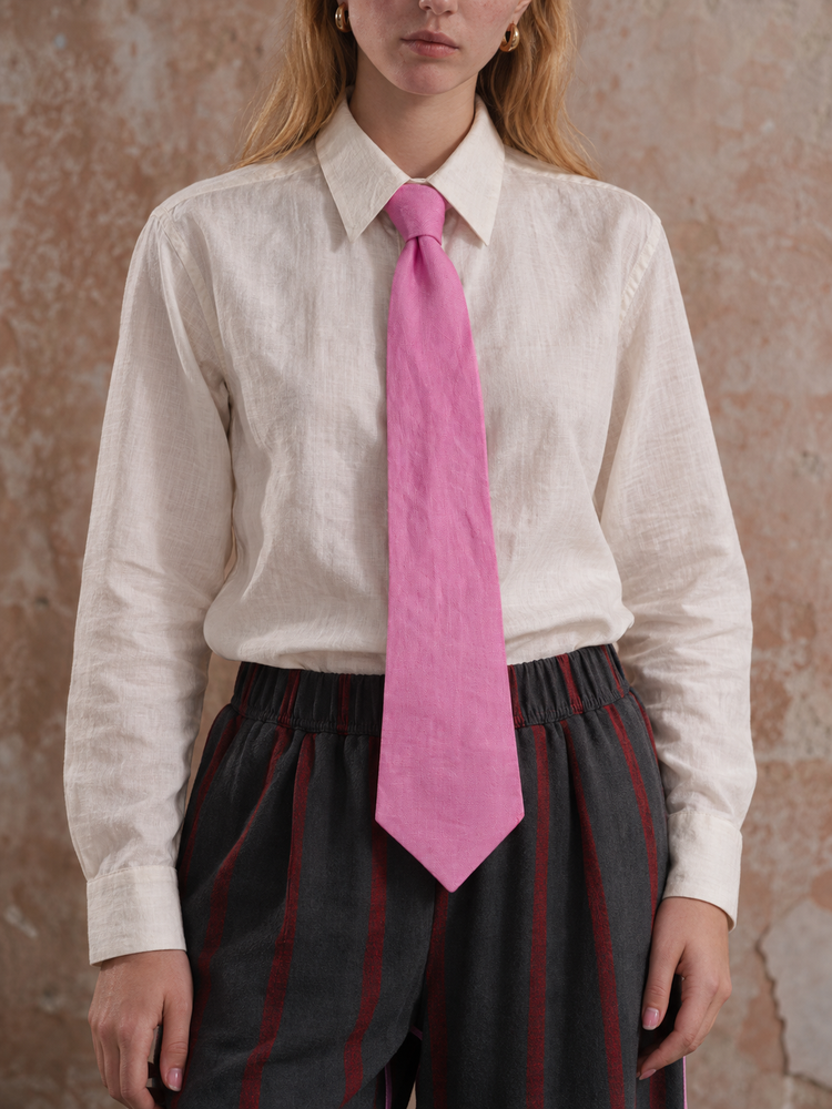Dad’s Tie in Loinnir Pink, tied over an ivory linen shirt