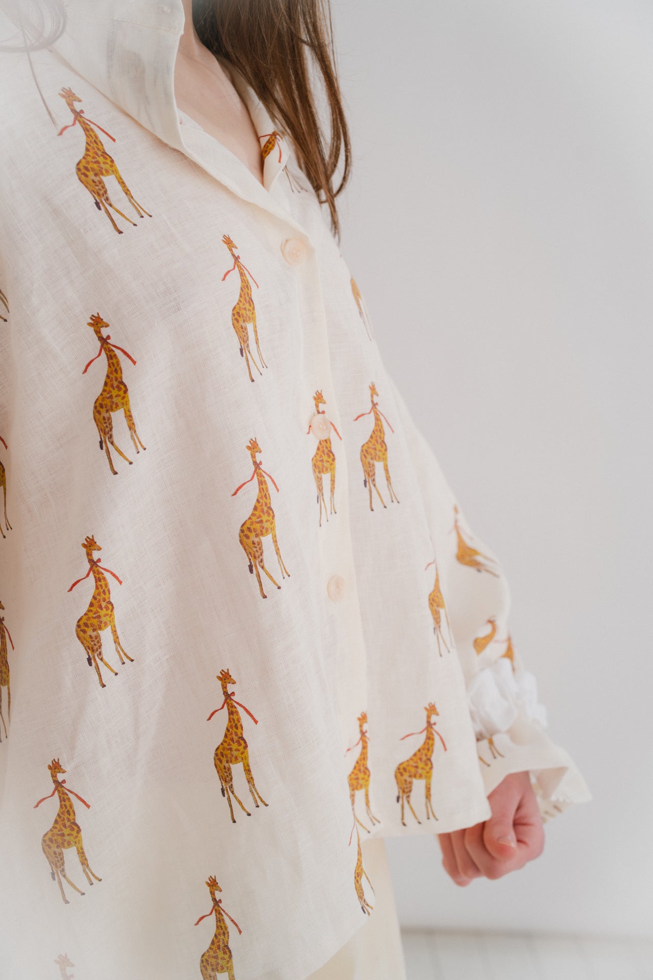 GIRAFFE PRINT SHIRT | Our most playful and fun piece from our SS24 collection. Our ‘Into The Wild’ concept was born out of an interest in the symbolism of the giraffe. Printed from a hand drawn watercolour painting by our designer Amy. Design adapted from