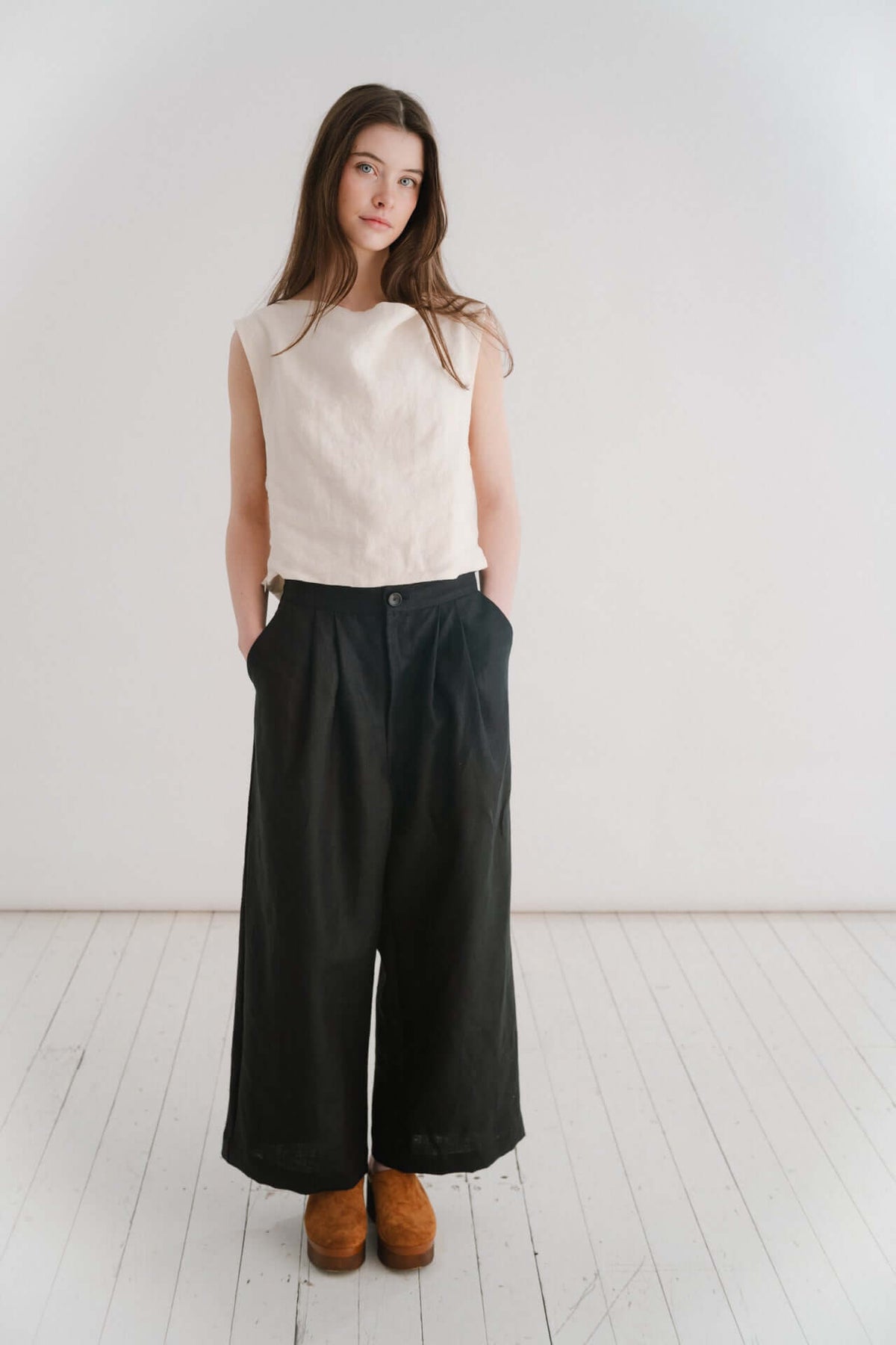 BOYFRIEND TROUSER - BLACK | The Boyfriend Trouser - a new, more tailored piece for SS24. Cut with a dropped crotch and wide leg. Contrasted with a smart waistband and pleat detail, these are so wearable yet will make you feel really put together. They pai