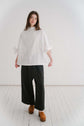 BOYFRIEND TROUSER - BLACK | The Boyfriend Trouser - a new, more tailored piece for SS24. Cut with a dropped crotch and wide leg. Contrasted with a smart waistband and pleat detail, these are so wearable yet will make you feel really put together. They pai