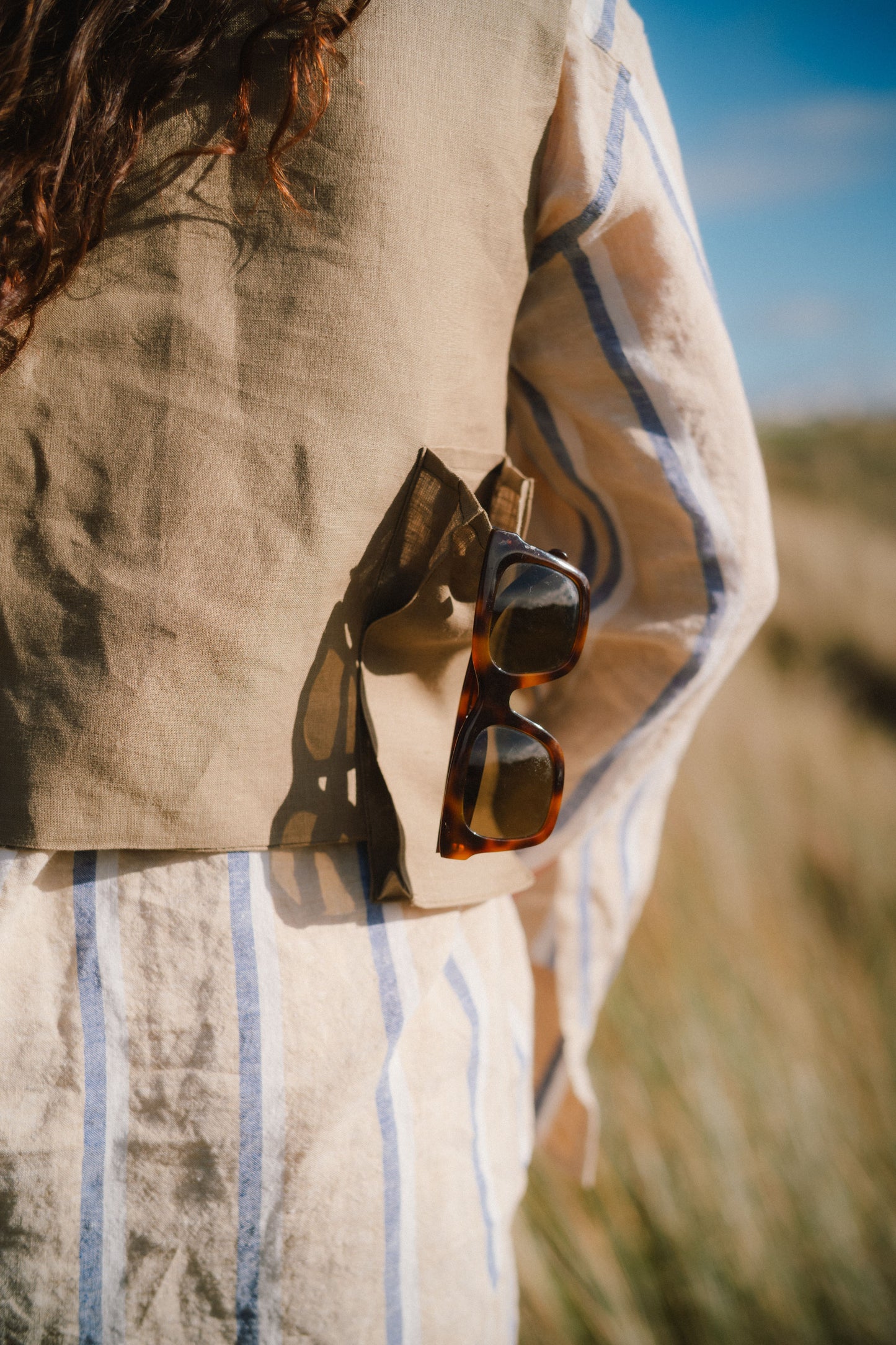 IN THE WILD VEST | A play on a traditional safari jacket, our new ‘In The Wild’ vest is fun worn by itself or as a layering piece for your Spring Summer wardrobe. A simple shape with tie closure detail, three cargo style pockets and bow detail on shoulder
