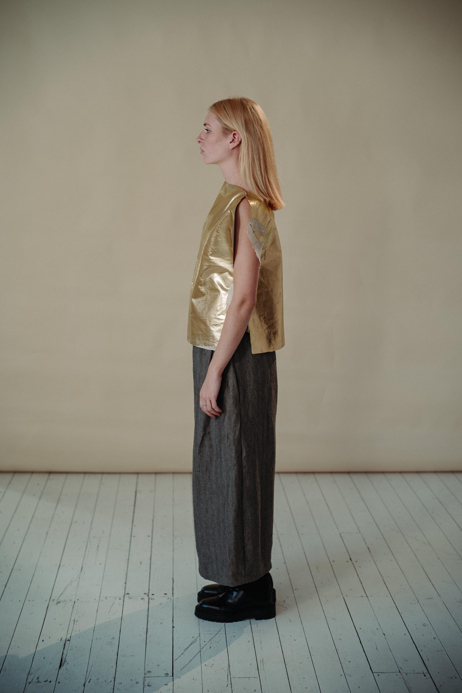 WRAP TROUSER | Our new oversized wrap trousers are created with a heavy weight herringbone linen. They feature a very slightly curved side seam and 'wrap over' detail at the waist. A little contrast gold stitching on the button hole to remind you to look