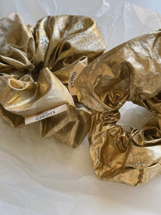 GOLDEN CLOUD SCRUNCHIE | A golden cloud for your hair. Made with cut offs from our gold beetled linen- this scrunchie will add fun to any simple outfit.