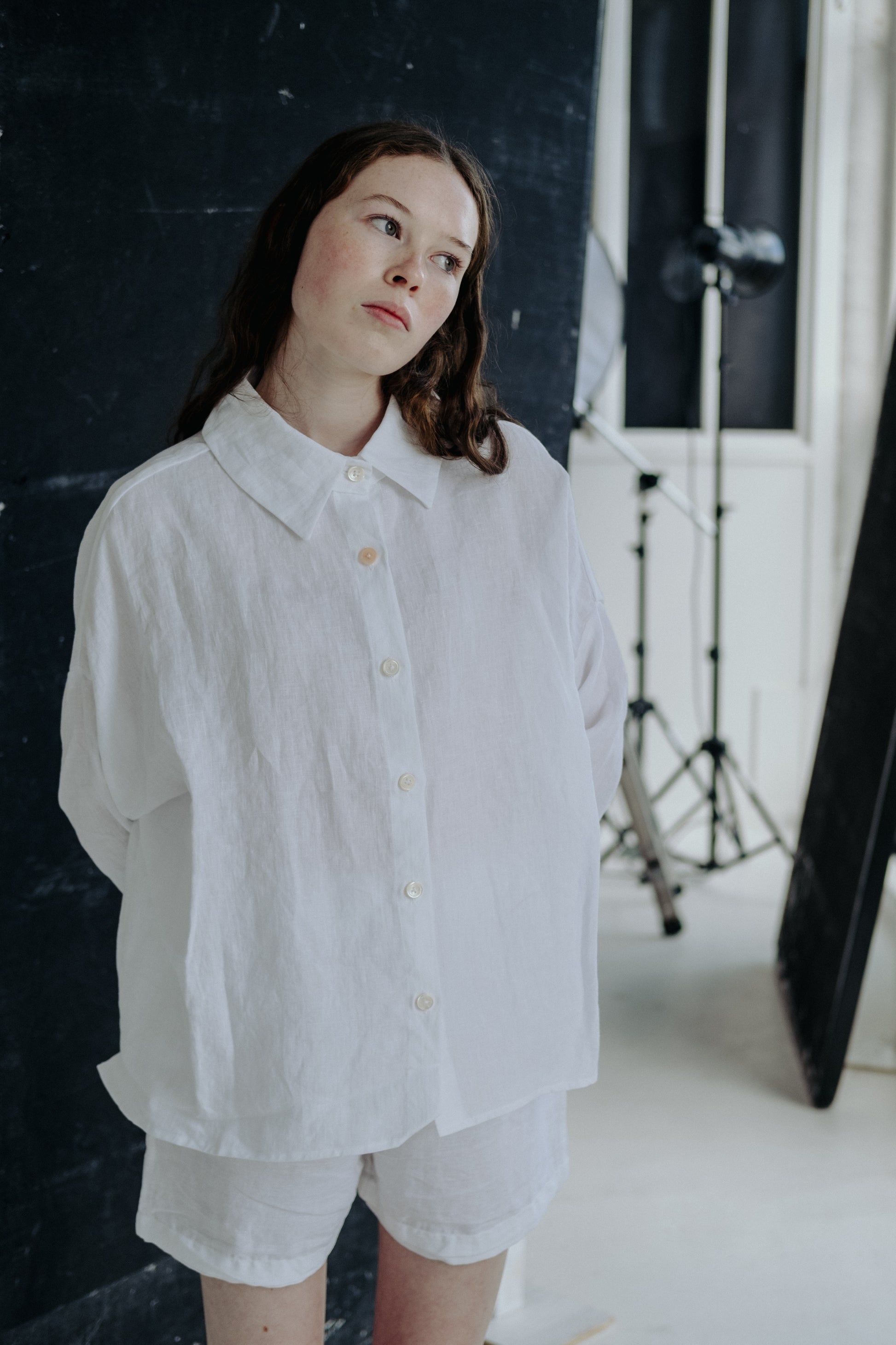 CADHLA SHIRT | WHITE | Relaxed, elegant and versatile. Cadhla - an Irish name translated as beauty. A Kindred favourite, and our first ever piece, this shirt examplifies the easy-wear ethos of the brand. Wear on one side with buttons for a beautiful dayti