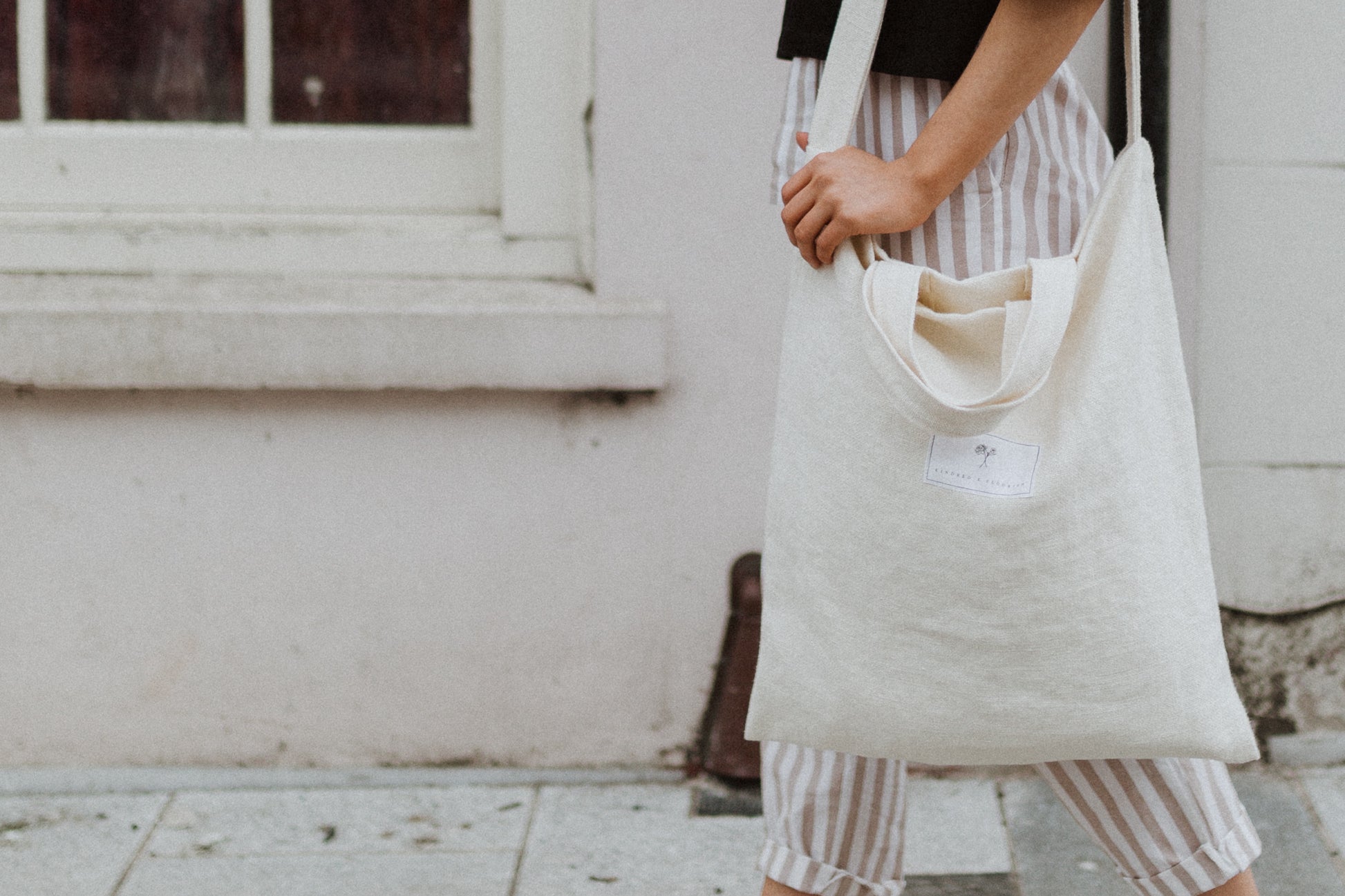 KINDRED X FLOURISH BAG | Inspired, Thoughtful, Considerate More than just a bag, this ethically sourced, any occasion accessory is part of a brighter future. Produced in Ireland by a talented team of seamstresses and cutters that have came through Flouris