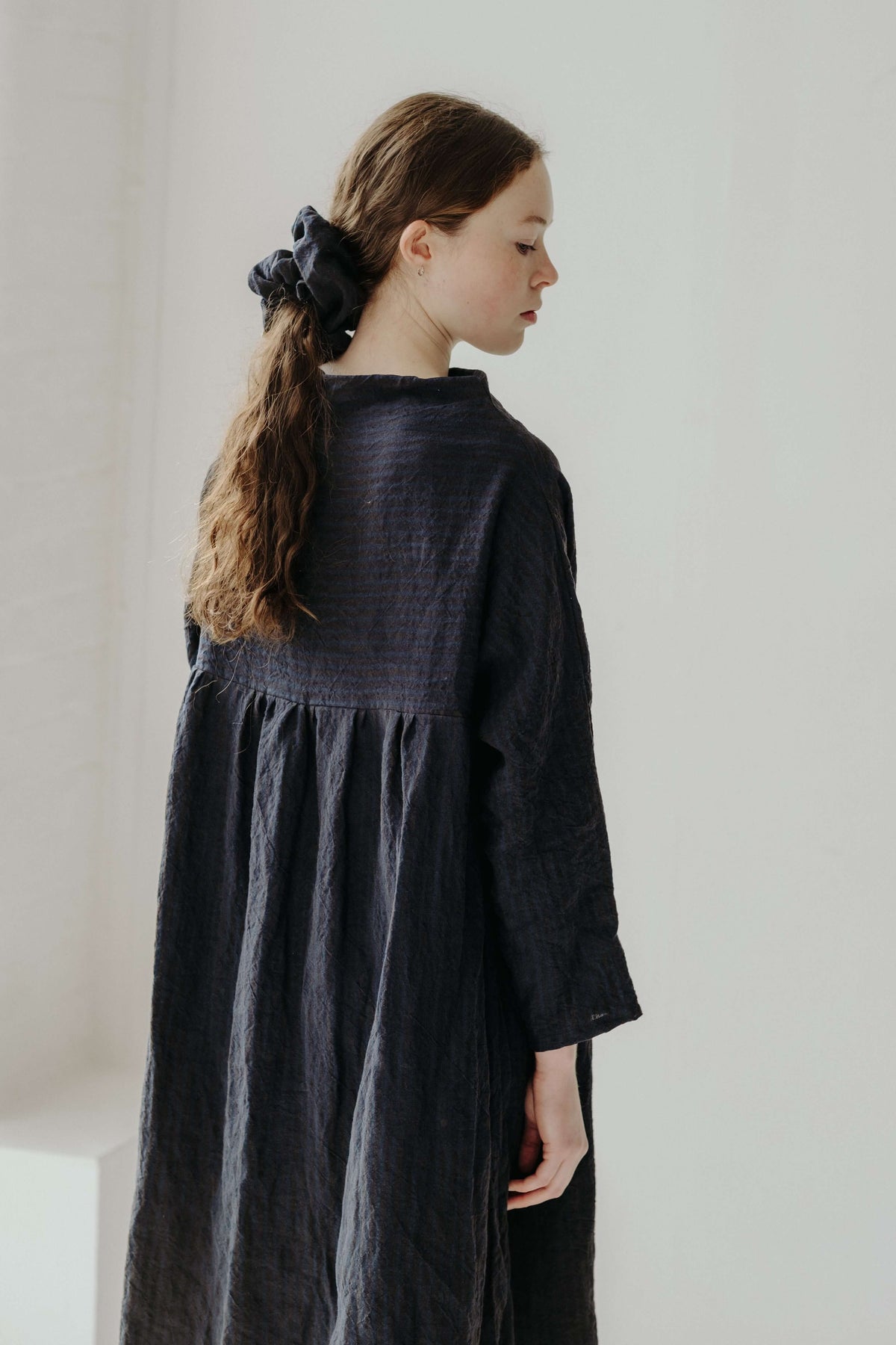 TILLIE DRESS | An effortless throw on that will feel right at home in a considered, every-day wardrobe. Tillie features a high neckline that sits elegantly across the neck- she can easily be dressed up or down and layered up for the colder months. Pair wi