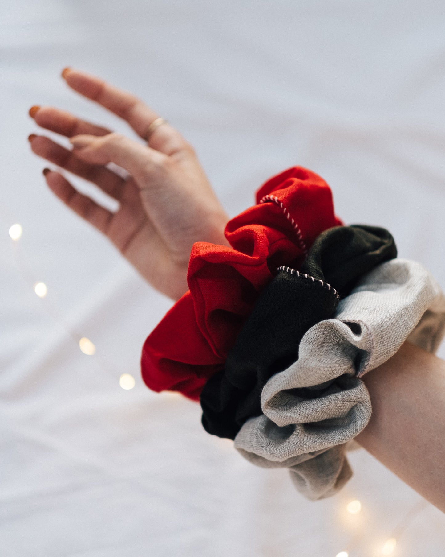 CHRISTMAS COMBO | Our Christmas Scrunchie Combo.- Poppy Red- Emerald Green- Oatmeal A festive pack of three limited edition scrunchies. A perfect stocking filler for your loved one or for you!Our scrunchies are made with soft Irish linen with loads of 'sc