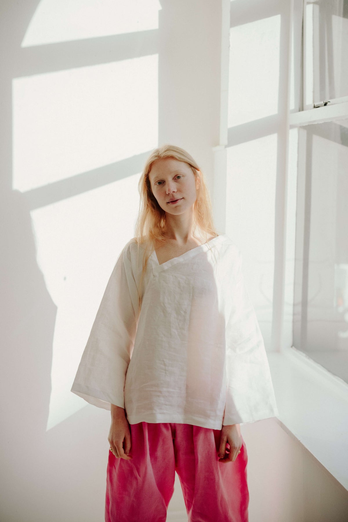ASYMMETRIC TEE | An update on our best selling staple- the kind tee. This one features a flattering assymetric neckline detail that makes it a little more special than your average white tee, yet really wearable and easy to dress up or down. Wear with our