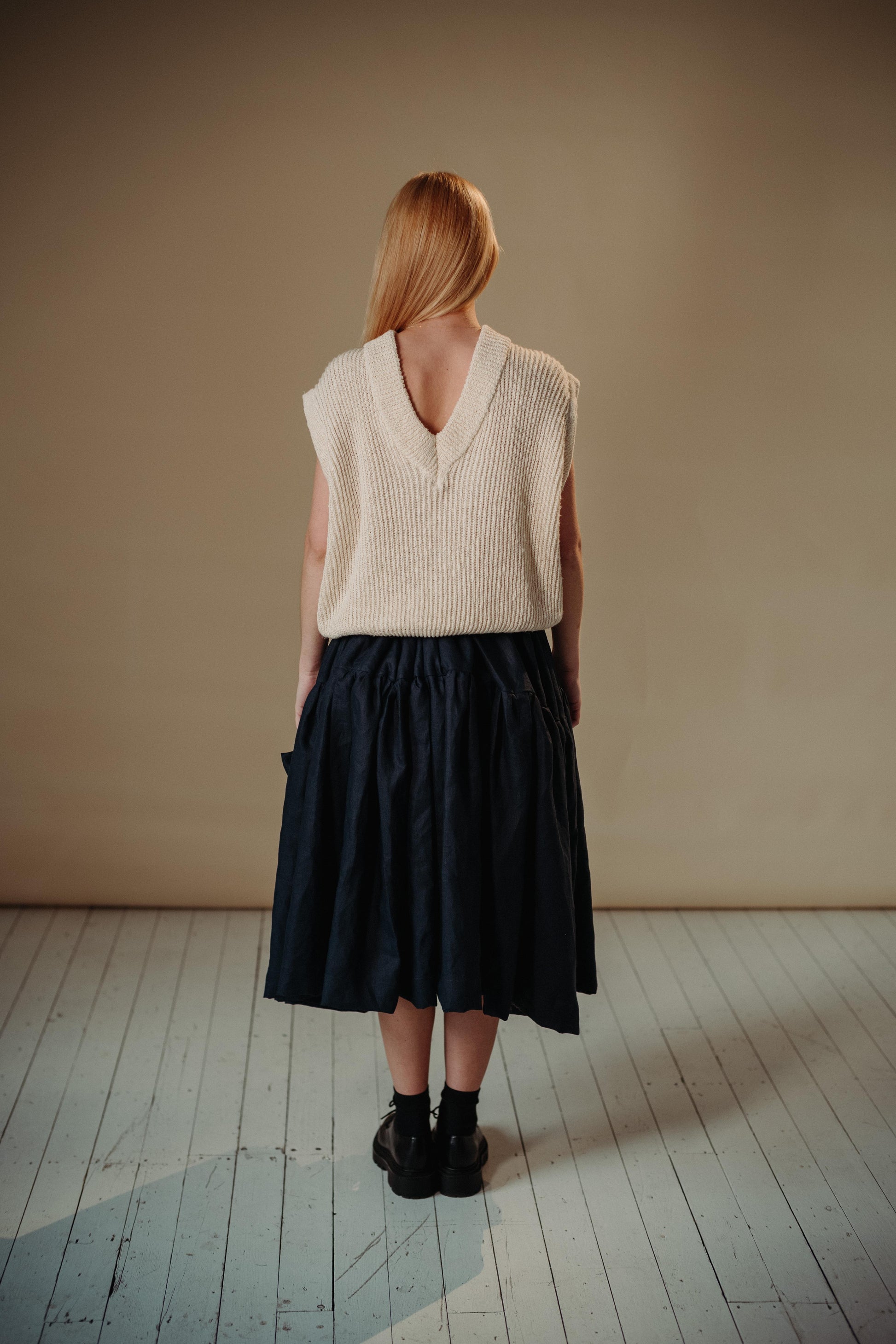 LINEN TUTU | The linen tutu - because no one ever really grows up enough to not want to wear a tutu! Voluminous, romantic and feminine, the tutu features two gathered layers with an oversized bow in a luxurious dark navy. Side seam pockets. Made with 100%