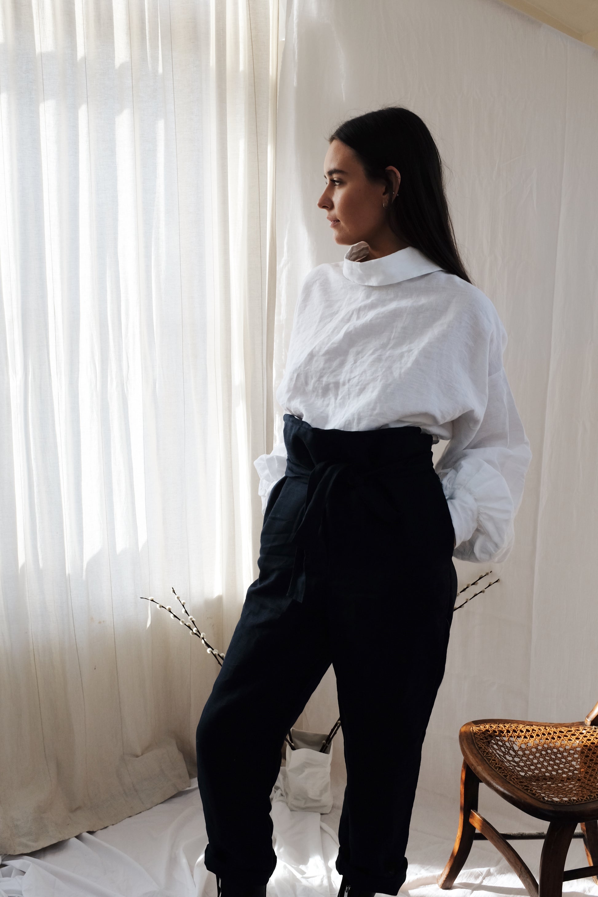 CADHLA SHIRT | WHITE | Relaxed, elegant and versatile. Cadhla - an Irish name translated as beauty. A Kindred favourite, and our first ever piece, this shirt examplifies the easy-wear ethos of the brand. Wear on one side with buttons for a beautiful dayti