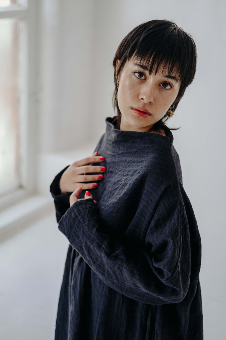 TILLIE DRESS | An effortless throw on that will feel right at home in a considered, every-day wardrobe. Tillie features a high neckline that sits elegantly across the neck- she can easily be dressed up or down and layered up for the colder months. Pair wi