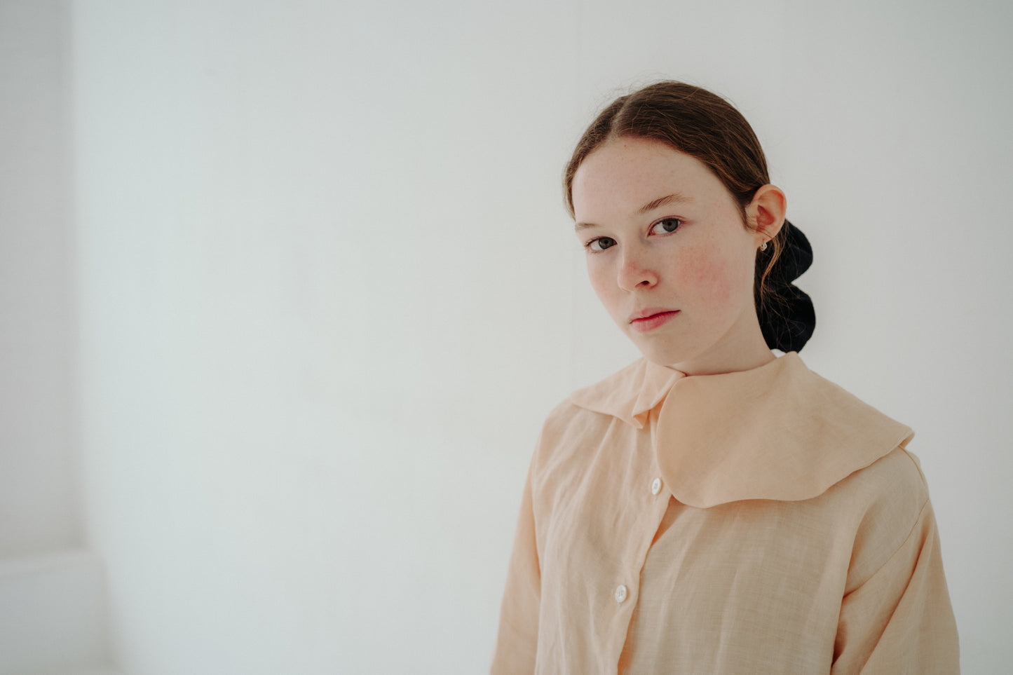 TABITHA BLOUSE | A fun update on our Willow blouse but with big collar drama. The Tabitha blouse features an oversized, asymmetric collar and cuffs with subtle embroidery detail on the back. Created with a very special naturally dyed linen, each blouse ca