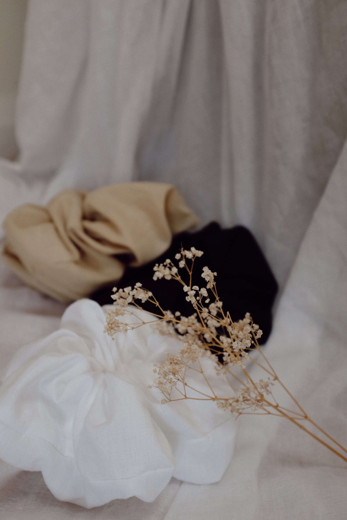 CLOUD SCRUNCHIE | For those ‘head in the clouds’ days. This 'extra' hair accessory was created to match the size of your dreams! Oversized scrunchies that look as good on your arm as they do in your hair. Coming in three colour-ways, these will become a s