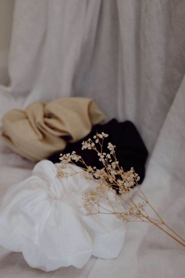 CLOUD SCRUNCHIE | For those ‘head in the clouds’ days. This 'extra' hair accessory was created to match the size of your dreams! Oversized scrunchies that look as good on your arm as they do in your hair. Coming in three colour-ways, these will become a s