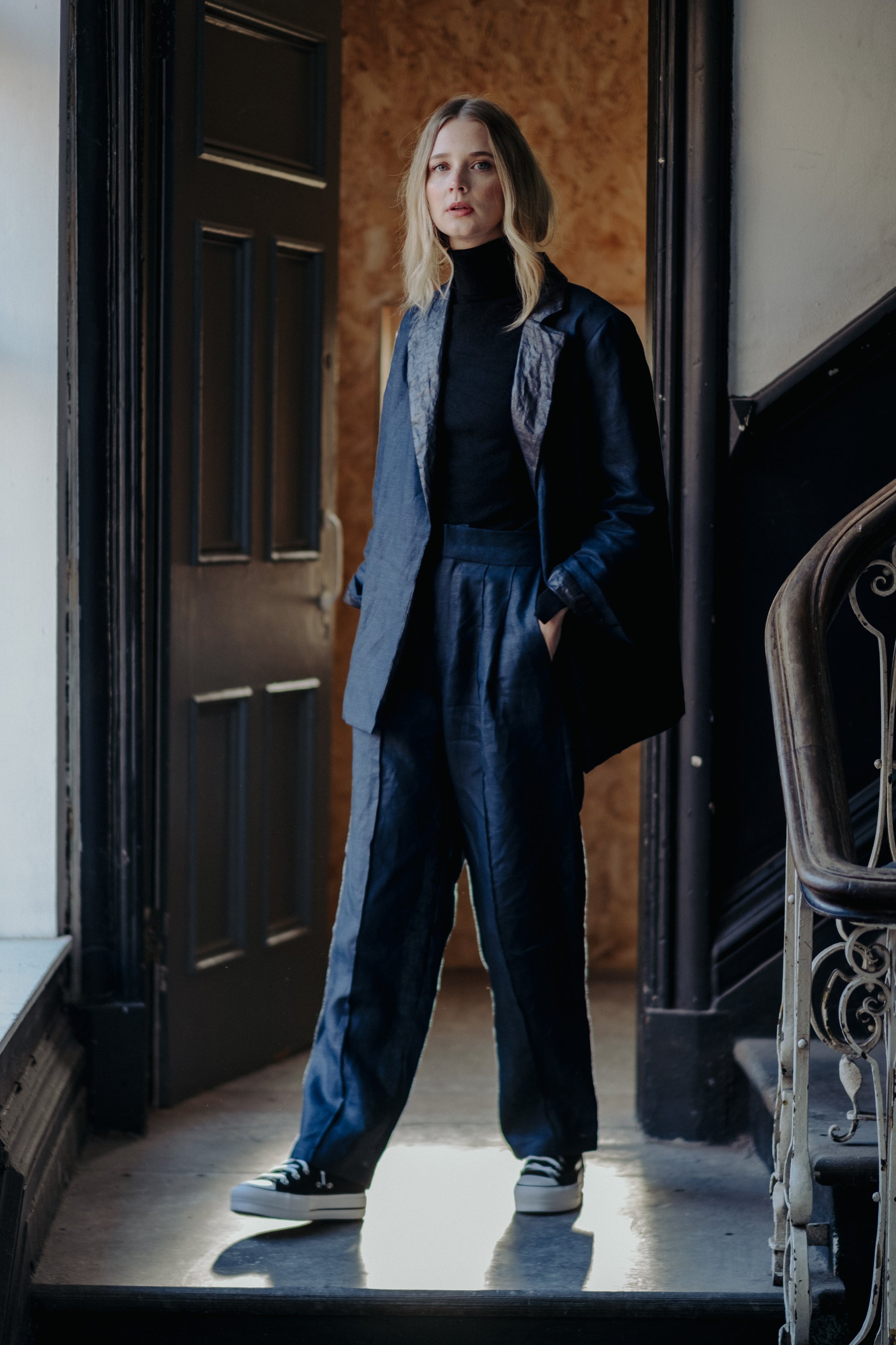 NAVY | BLACK BEETLED SUIT JACKET | Our spin on the classic suit jacket. Our new suit is where structure and tailoring meet relaxed oversized fit, making it a perfect day to day throw on that is versatile enough to wear to the office as well as a festive p