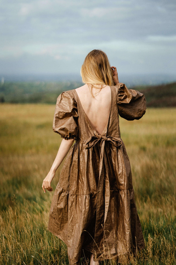 PAPER BAG DRESS | Ever been told... You'd look good in a paper bag!' Well, now you can try it out! Our AW 'Paper Bag' dress is a fun addition to your wardrobe. Created with Beetled linen, a process unique to Ireland whereby the linen is pounded with woode