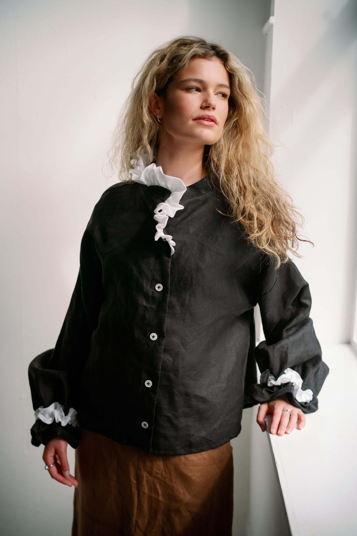 MARSHMALLOW- BLACK | An updated colourway of our favourite 'Marshmallow Blouse' for AW23. A playful contrast of black and white makes this one a more statement piece for your Autumn/Winter wardrobe. Like many of our styles, this one can be worn with butto